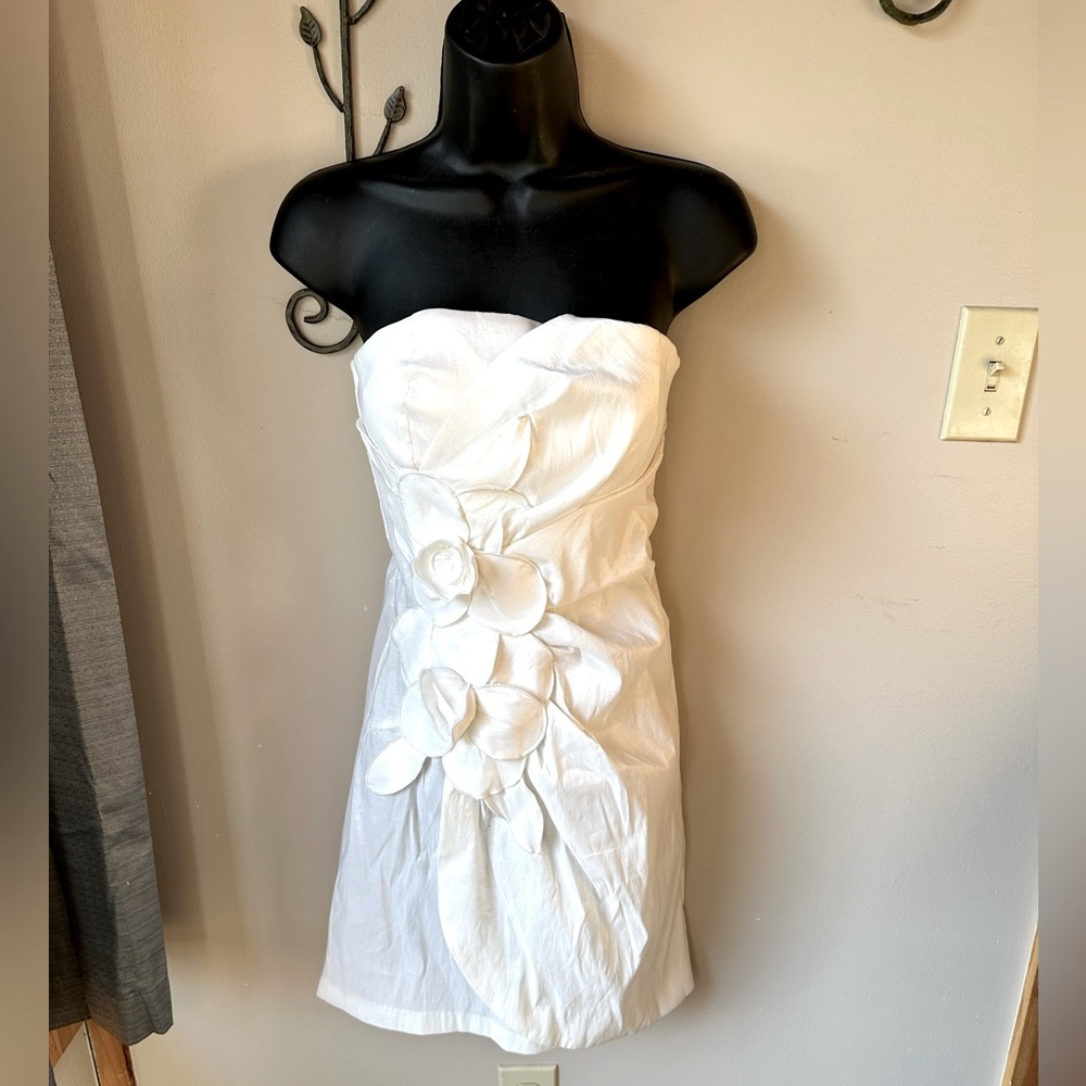 Strapless white sheath dress. Stretchy taffeta type material.